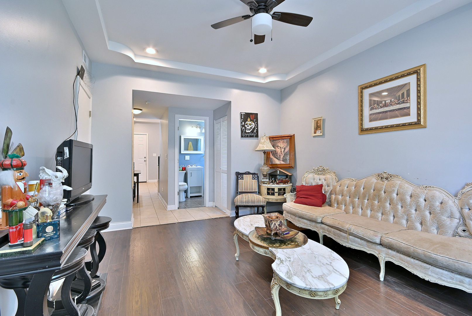 5125 South Elizabeth Street Chicago, IL 60609 - Photo 36 of 61 a living room with furniture and a wooden floor
