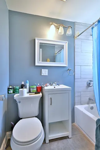 a kitchen with stainless steel appliances a sink stove and refrigerator