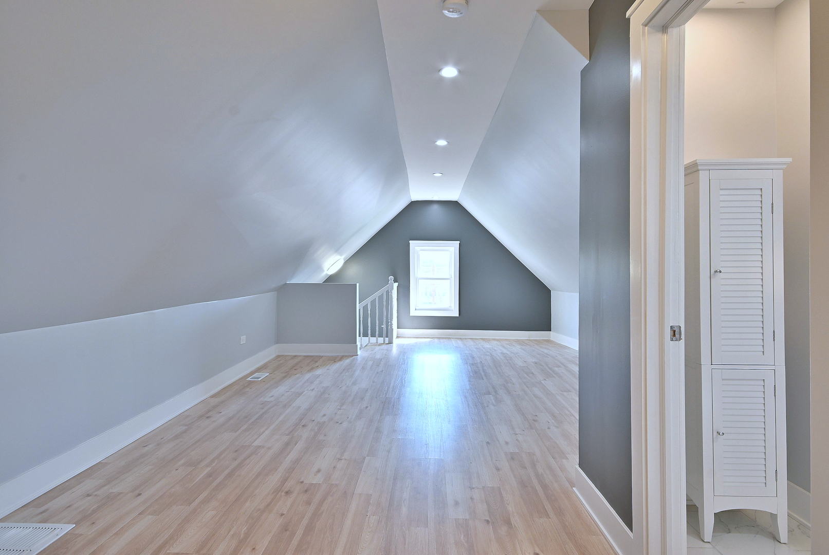 5125 South Elizabeth Street Chicago, IL 60609 - Photo 56 of 61 a view of empty room with wooden floor
