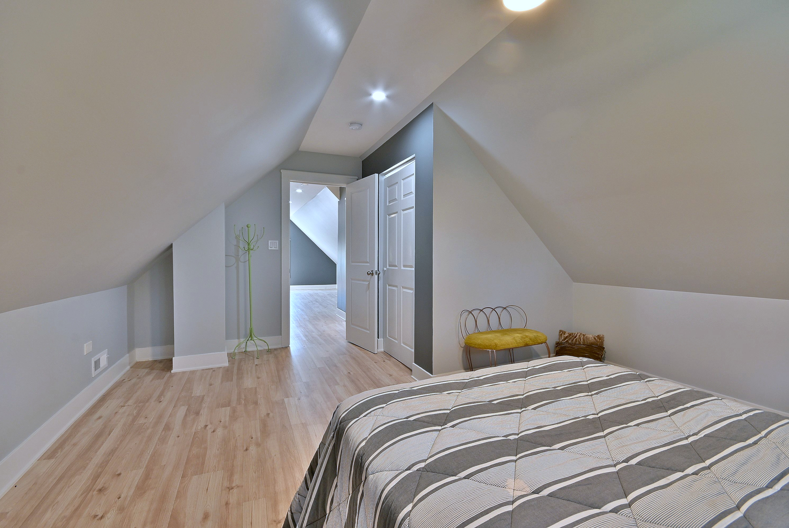 5125 South Elizabeth Street Chicago, IL 60609 - Photo 58 of 61 a bedroom with a bed and wooden floor