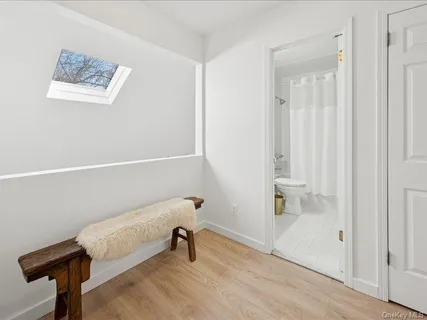 a view of a hallway with front door