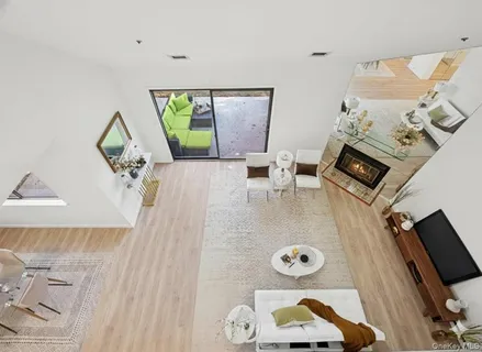 a view of living room with furniture and a flat screen tv