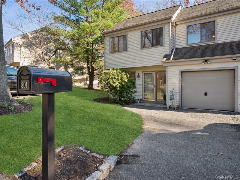 801 Hunters Run Dobbs Ferry, NY 10522 - Photo 25 of 32 a sign that is on the side of the road