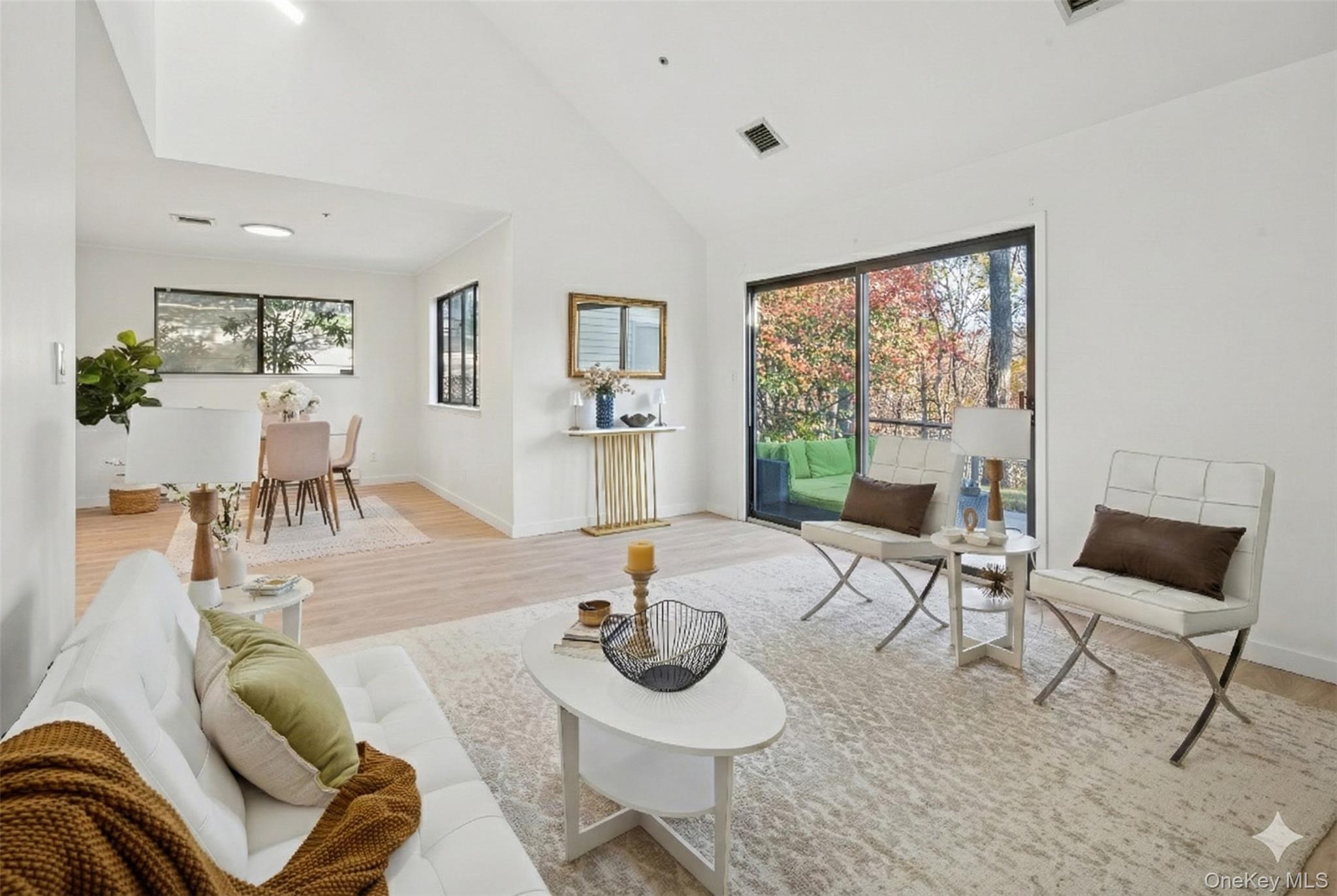 801 Hunters Run Dobbs Ferry, NY 10522 - Photo 3 of 32 a living room with furniture and a floor to ceiling window