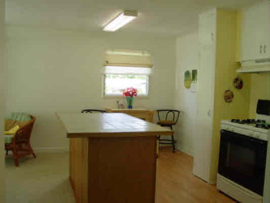 44 Kilua Road Hilo, HI 96720 - Photo 8 of 15 a room with storage and utility