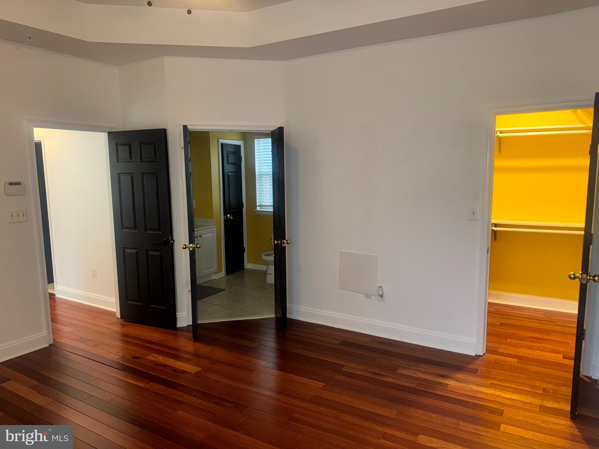 127 Albemarle Street, Unit 36 Baltimore, MD 21202 - Photo 14 of 25 a view of empty room with wooden floor