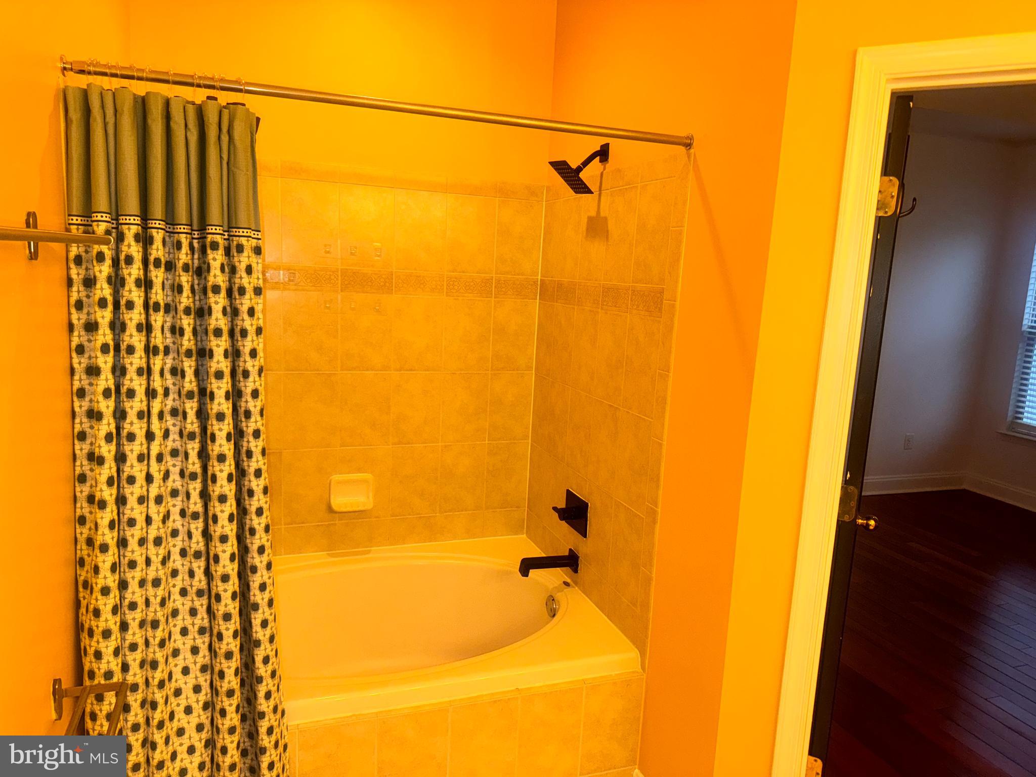 127 Albemarle Street, Unit 36 Baltimore, MD 21202 - Photo 22 of 25 a bathroom with a shower