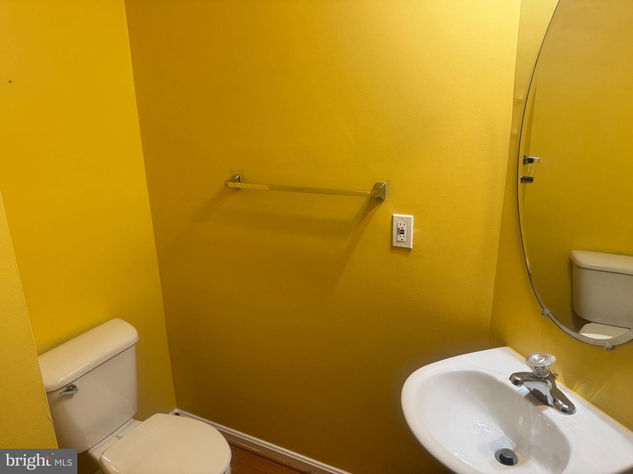 127 Albemarle Street, Unit 36 Baltimore, MD 21202 - Photo 24 of 25 a bathroom with a sink and a toilet