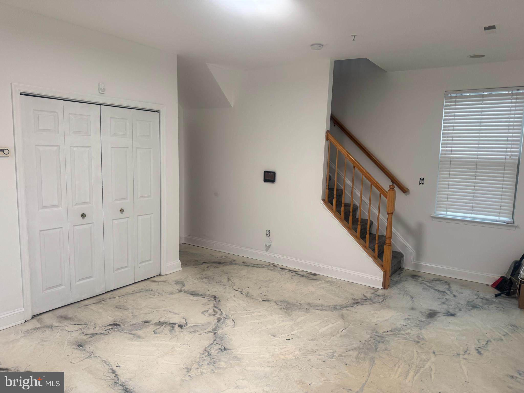 127 Albemarle Street, Unit 36 Baltimore, MD 21202 - Photo 7 of 25 a view of a hallway with staircase