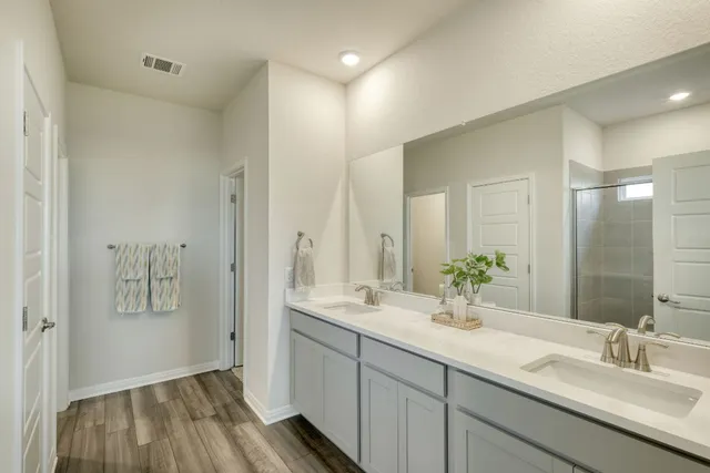 a bedroom with bed and window