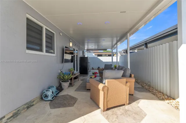 a view of a porch with furniture