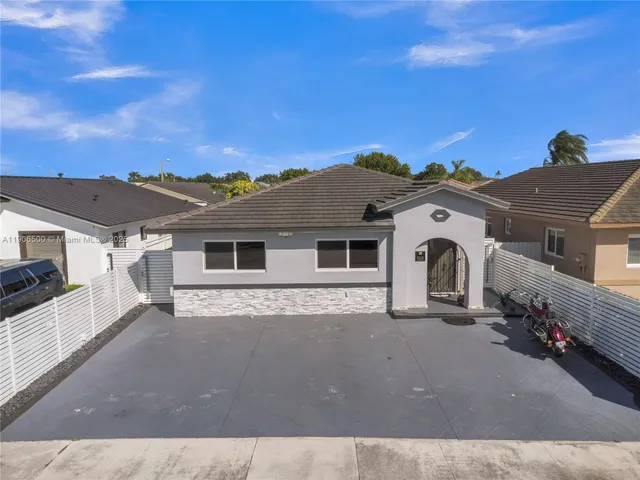 a view of house with a outdoor space