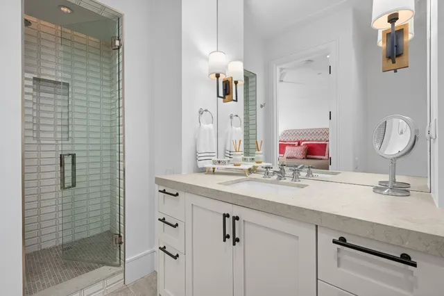 a bathroom with a double vanity sink and a mirror