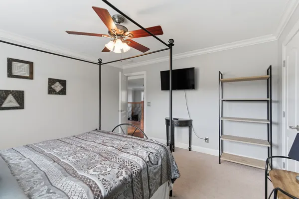 a kitchen with stainless steel appliances granite countertop a refrigerator a stove a sink and a refrigerator