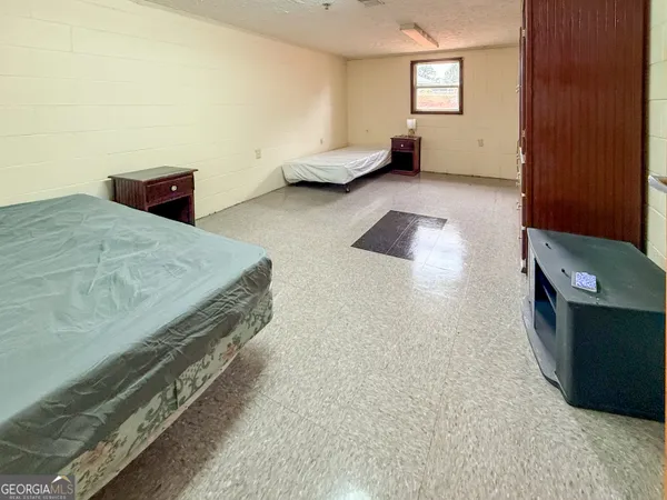 a room with furniture and window