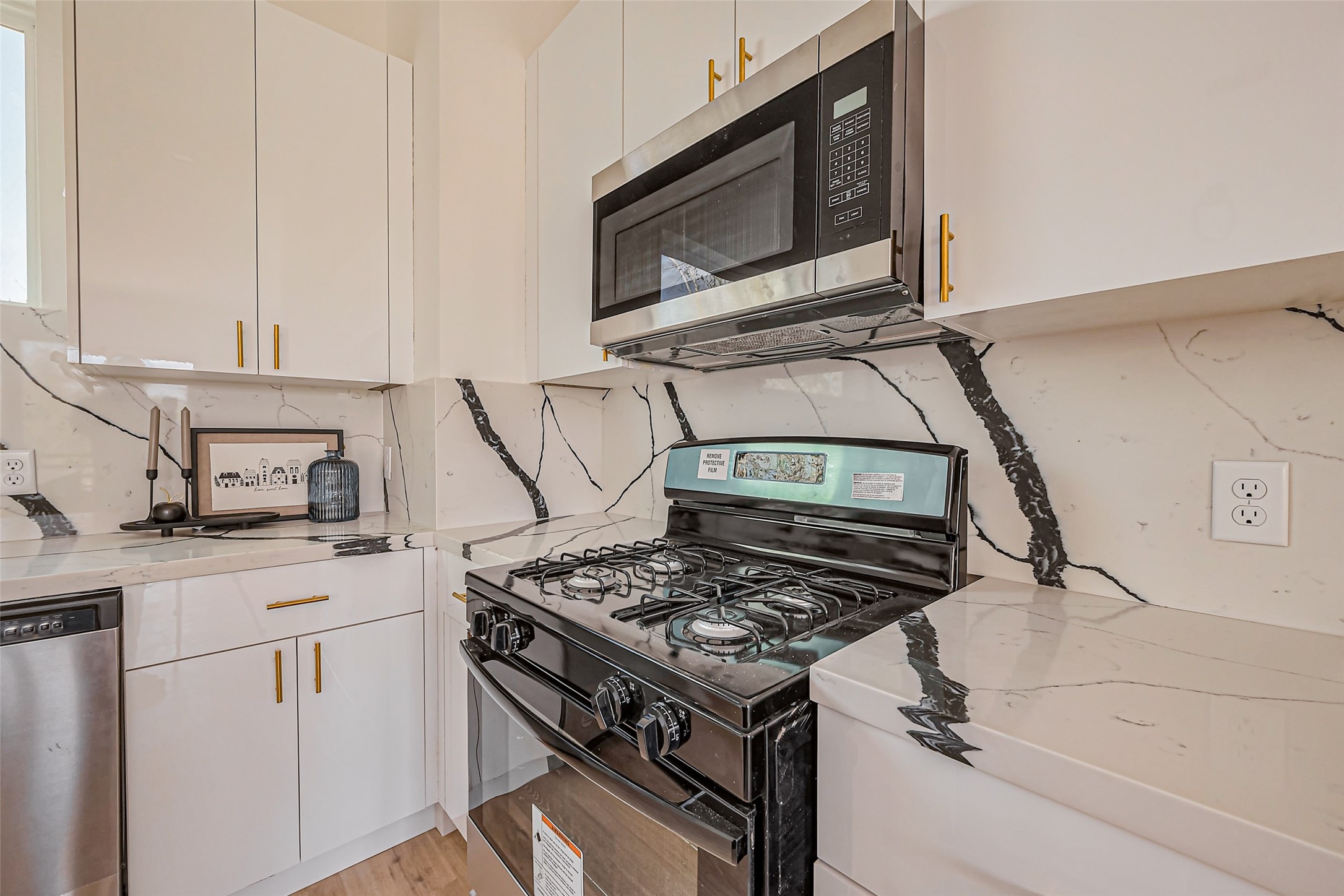 4207 Ward Street Houston, TX 77021 - Photo 14 of 43 a stove top oven sitting inside of a kitchen