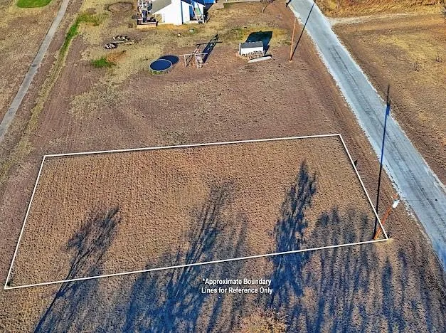 a view of a balcony with wooden floor