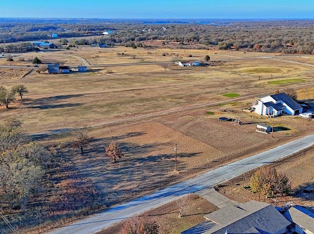141 Diamond Oaks Drive Nocona, TX 76255 - Photo 7 of 16 a view of an ocean and beach
