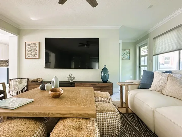 a bedroom with two beds and a window