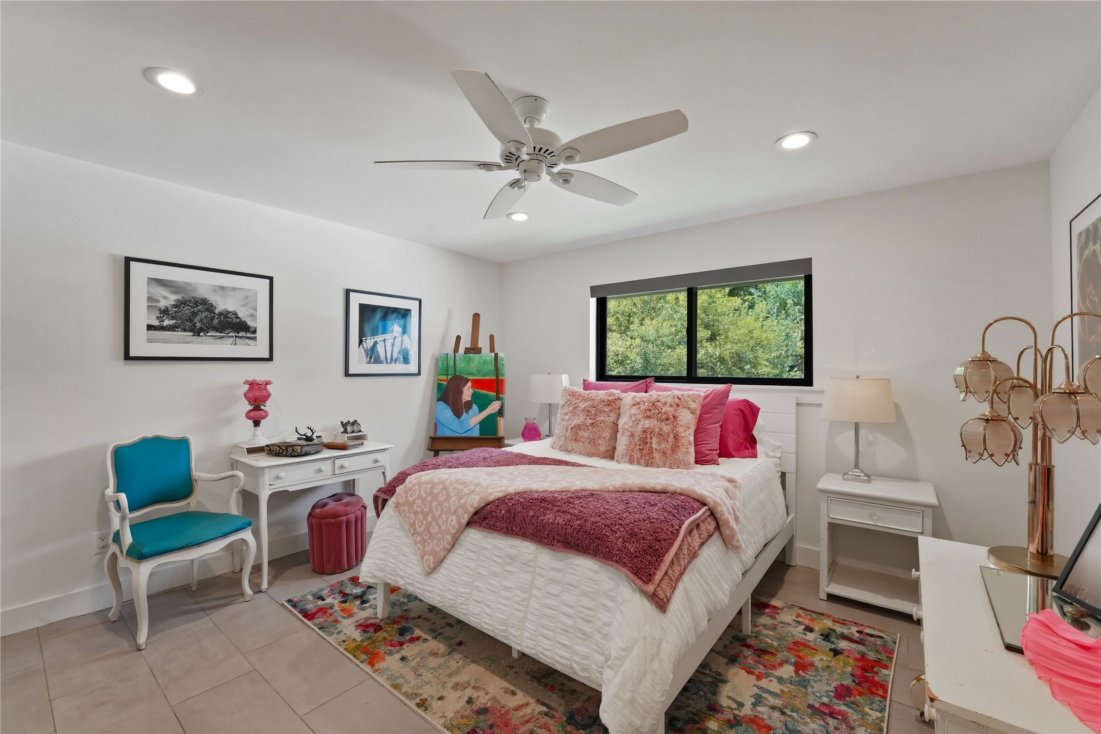 1124 Bowie Street Columbus, TX 78934 - Photo 16 of 28 a bedroom with a bed a couch and a window