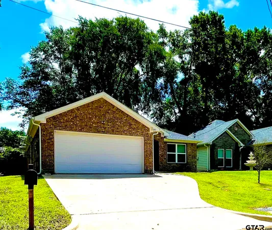 a view of house with yard