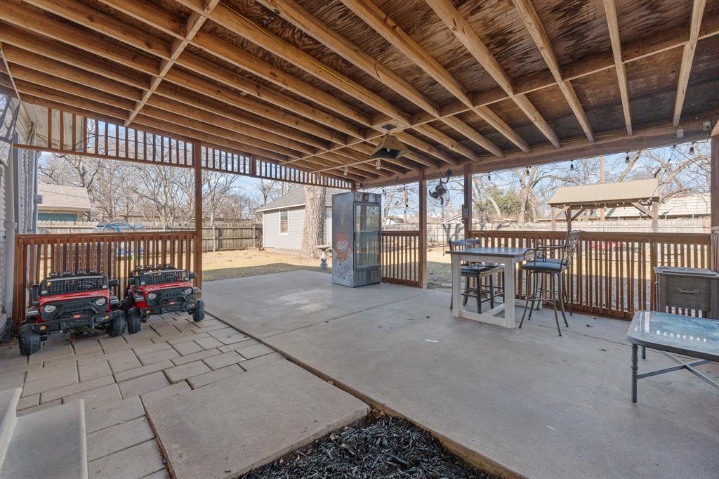 700 Euclid Street Cleburne, TX 76033 - Photo 24 of 35 a view of a room with wooden floor
