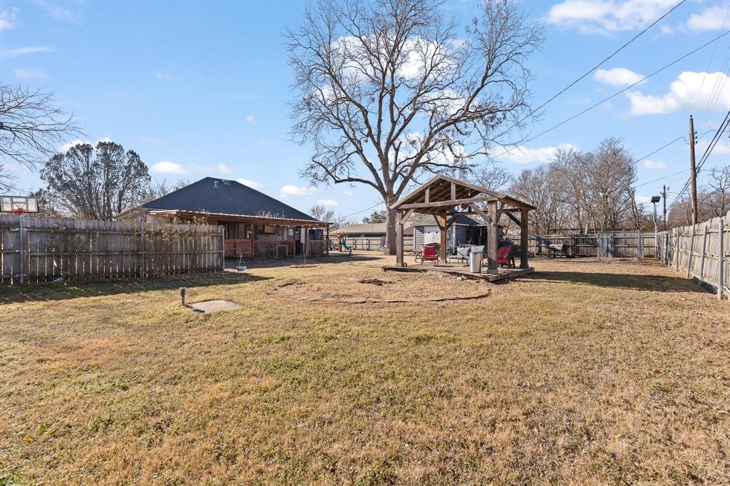 700 Euclid Street Cleburne, TX 76033 - Photo 27 of 35 a street view with residential houses