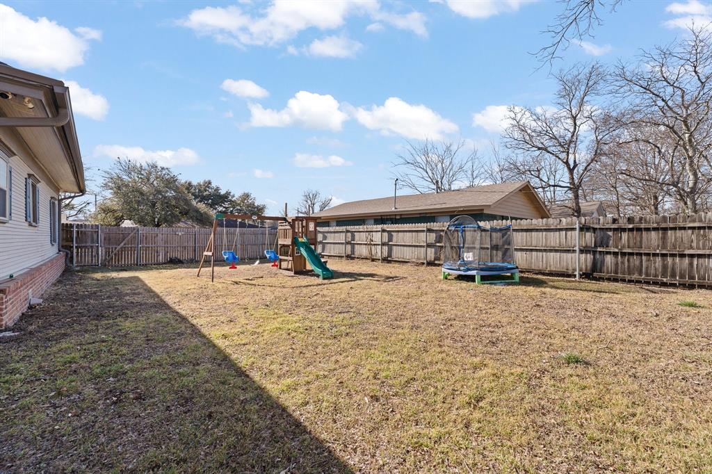 700 Euclid Street Cleburne, TX 76033 - Photo 30 of 35 a view of a house with snow on the road