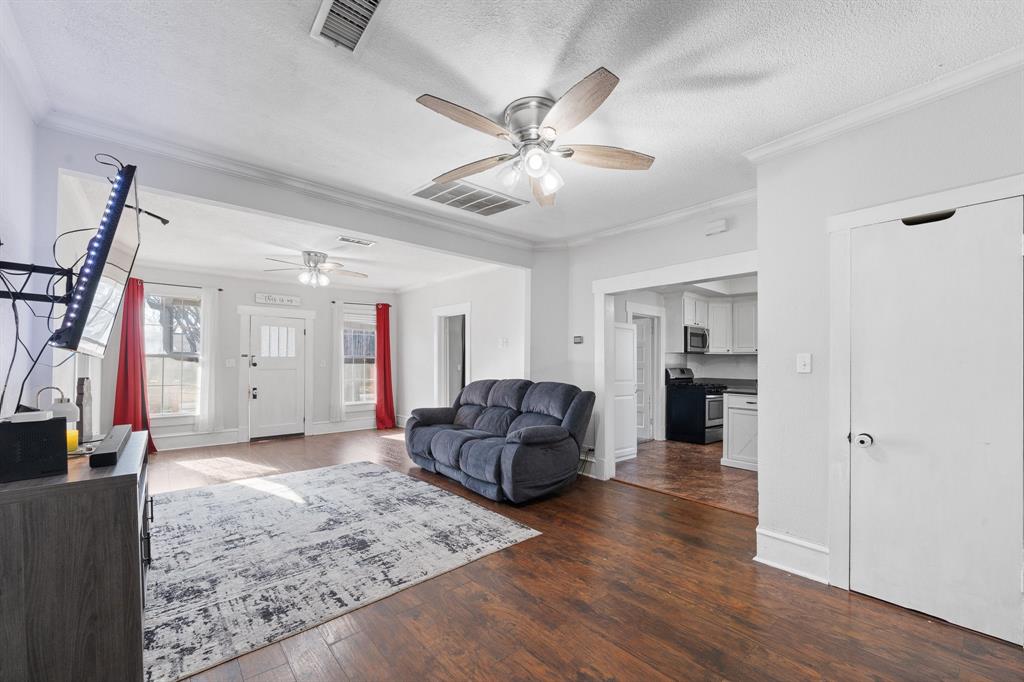 700 Euclid Street Cleburne, TX 76033 - Photo 7 of 35 a living room with furniture and wooden floor