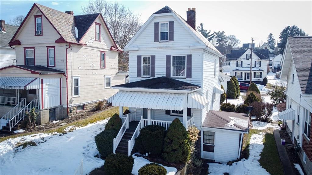117 Lyon Avenue Butler, PA 16001 - Photo 2 of 43 a front view of house with yard outdoor seating and barbeque oven
