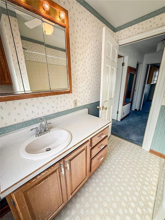 117 Lyon Avenue Butler, PA 16001 - Photo 40 of 43 a bathroom with a sink and a mirror