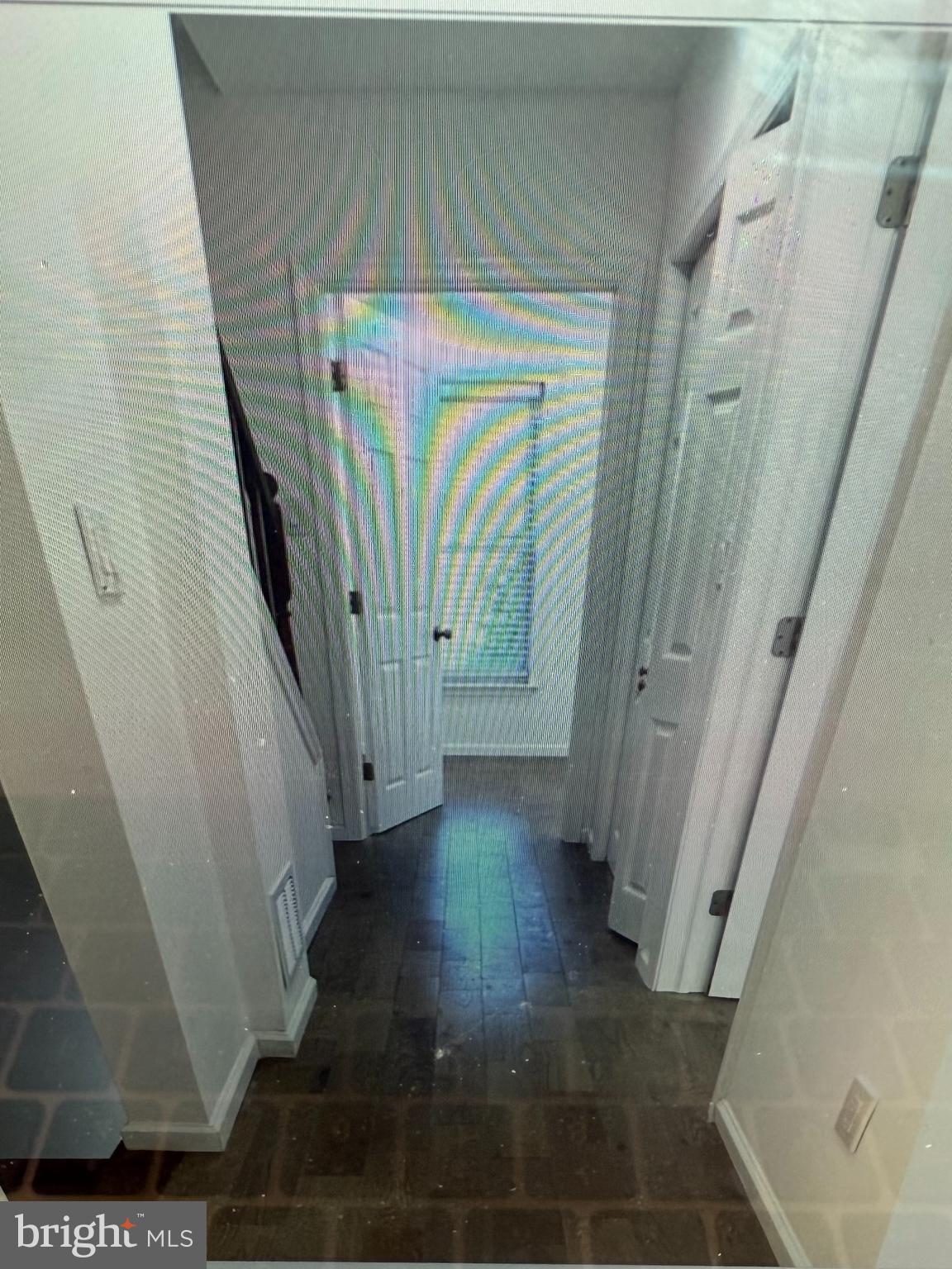 1324 Palethorp Street Philadelphia, PA 19122 - Photo 5 of 9 a view of a hallway with wooden floor and staircase