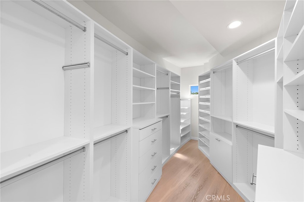 727 Bayview Place Laguna Beach, CA 92651 - Photo 41 of 75 a view of walk in closet with empty racks