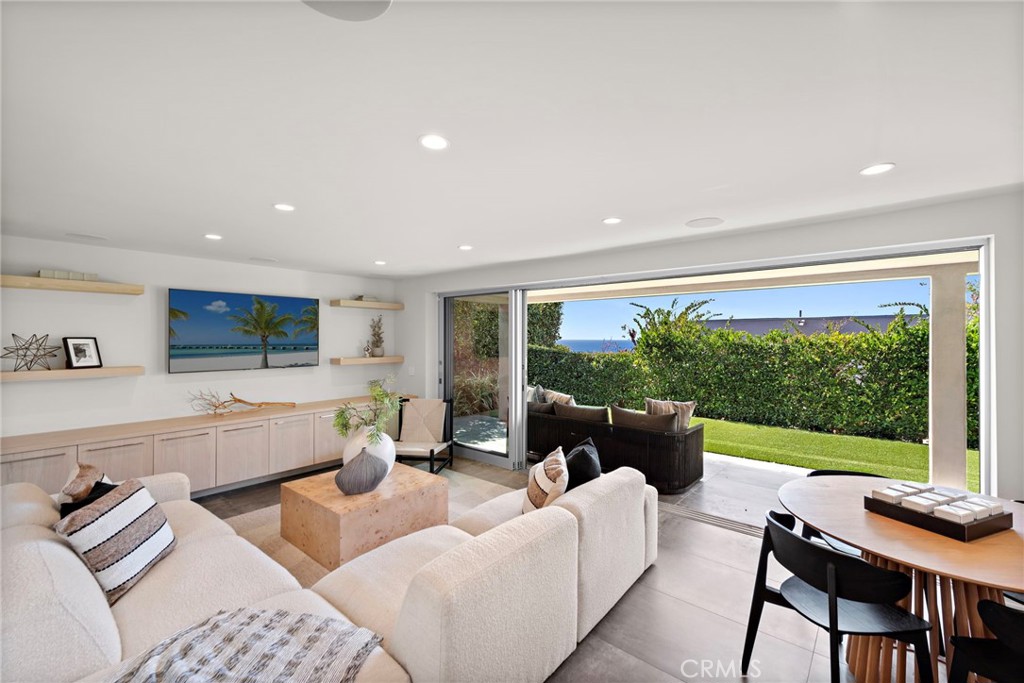 727 Bayview Place Laguna Beach, CA 92651 - Photo 53 of 75 a living room with furniture and a large window