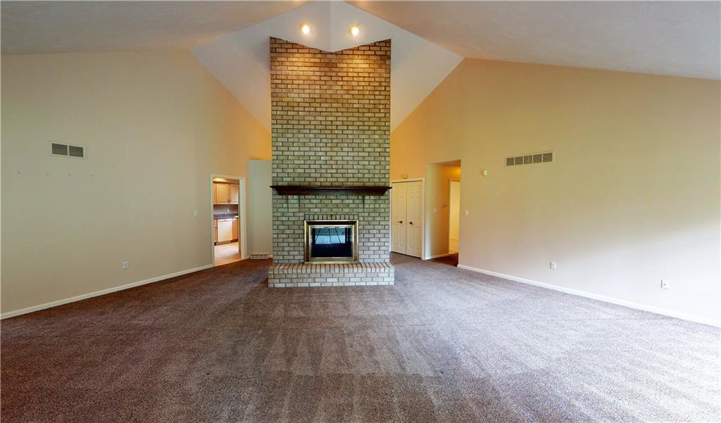 160 Robinson Run Road Butler, PA 16002 - Photo 7 of 25 Stand Alone Brick Fireplace is focal point of Living Room