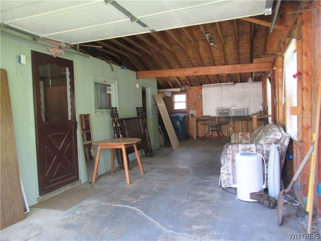 401 Lakeside Road Evans, NY 14006 - Photo 30 of 30 Attached Garage w/ Workshop Area & Storage!