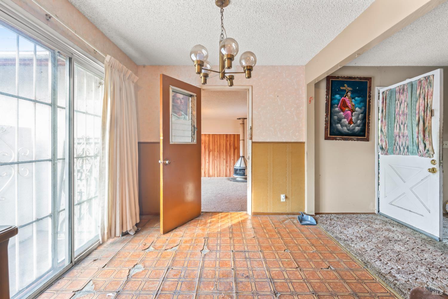 58 Solano Avenue Bay Point, CA 94565 - Photo 14 of 33 a view of a room with wooden floor and windows