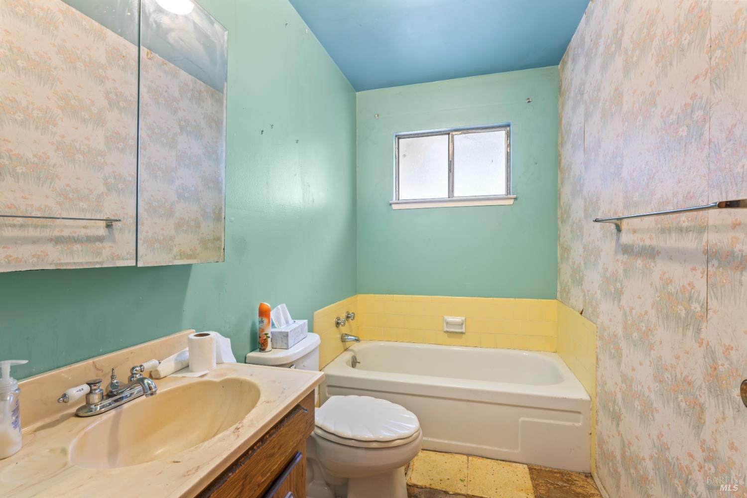 58 Solano Avenue Bay Point, CA 94565 - Photo 18 of 33 a bathroom with a sink a toilet and a bathtub