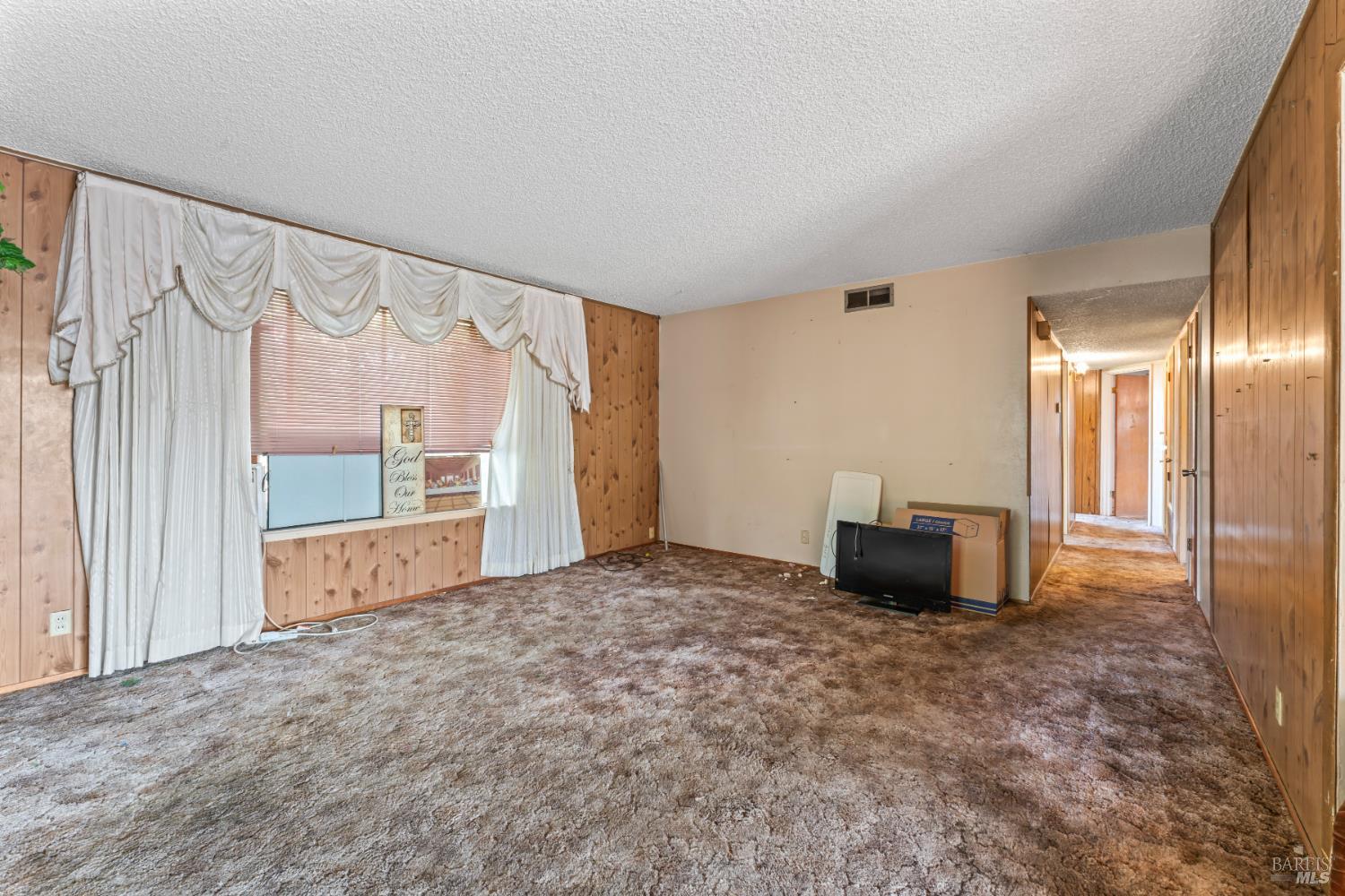 58 Solano Avenue Bay Point, CA 94565 - Photo 10 of 33 a view of empty room with a fireplace