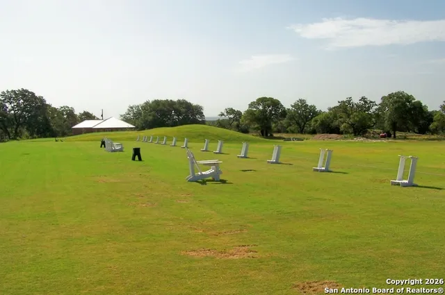 a view of a lake with a big yard