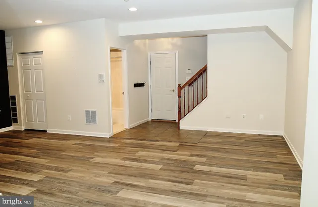 a view of a wooden deck with a bench