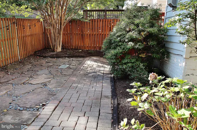 a front view of a house with yard