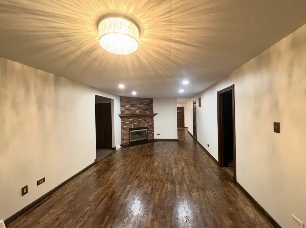 3529 Carpenter Street Steger, IL 60475 - Photo 8 of 20 a view of a livingroom with wooden floor