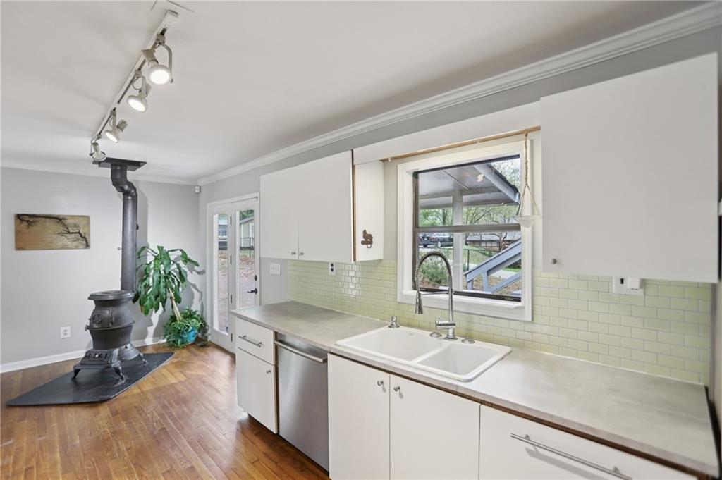 3224 Kensington Road Avondale Estates, GA 30002 - Photo 15 of 59 a kitchen with a sink and a large window