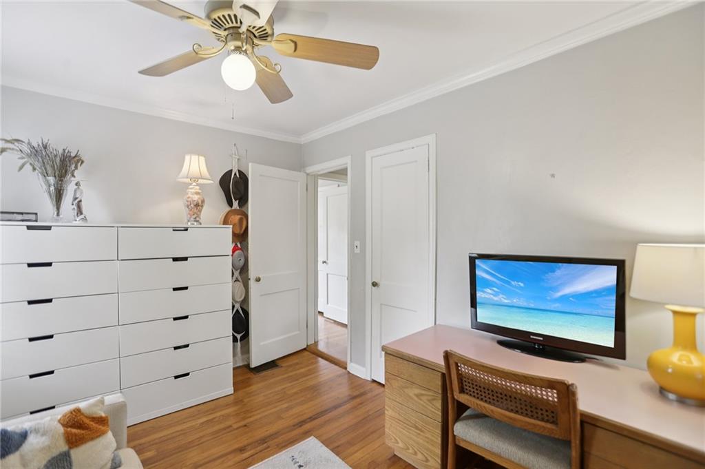 3224 Kensington Road Avondale Estates, GA 30002 - Photo 28 of 59 a view of a workspace with furniture and wooden floor