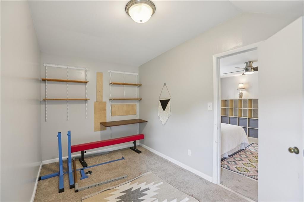 3224 Kensington Road Avondale Estates, GA 30002 - Photo 32 of 59 a room that has a couch and a table in it