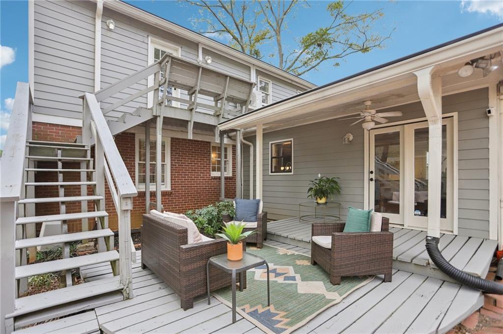 3224 Kensington Road Avondale Estates, GA 30002 - Photo 38 of 59 a view of a patio with couches chairs and potted plants