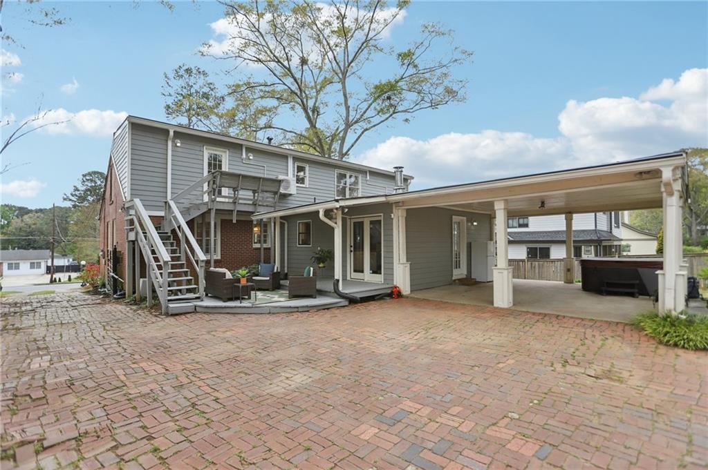 3224 Kensington Road Avondale Estates, GA 30002 - Photo 40 of 59 a view of a house with backyard porch and sitting area