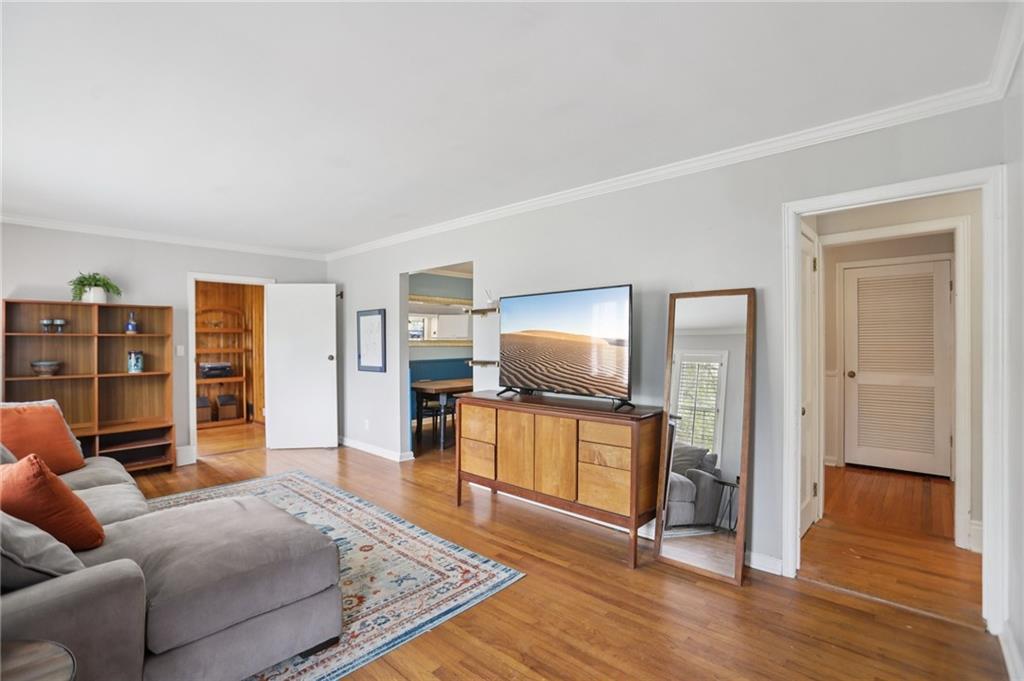 3224 Kensington Road Avondale Estates, GA 30002 - Photo 4 of 59 a living room with furniture and a flat screen tv