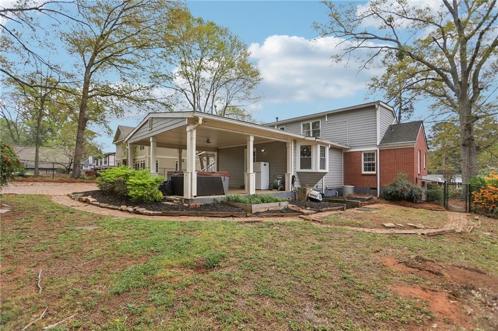 3224 Kensington Road Avondale Estates, GA 30002 - Photo 41 of 59 a view of a house with backyard and trees